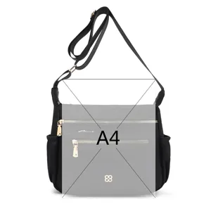 Detailed view of a black multi-pocket crossbody bag showing A4 size storage capacity