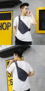 Men's slim tactical chest bag for cycling and sports in dark grey finish
