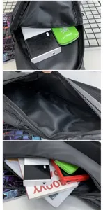 Detail view showing large capacity and multi-compartment interior of black sling bag