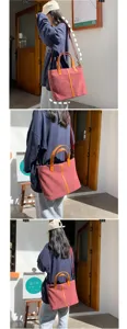 Vue détaillée du sac cabas en toile bordeaux avec poignées en cuir et bandoulière