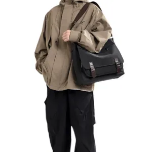 Large black canvas messenger bag for men with adjustable strap and leather buckles