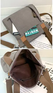Detailed view of grey canvas bag compartments and the spacious brown interior lining