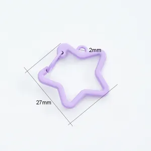 Macro detail view of a purple star-shaped spring hook clasp for DIY keychain crafts.