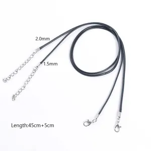 Detailed view of 1.5mm and 2.0mm black waxed cord necklaces with adjustable chains