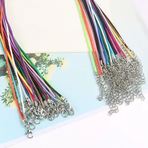 Detailed macro view of colorful 1.5-2mm waxed necklace cords with lobster clasps