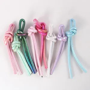 Macro view of 5mm pearlized PU leather knotted cords in various metallic colors