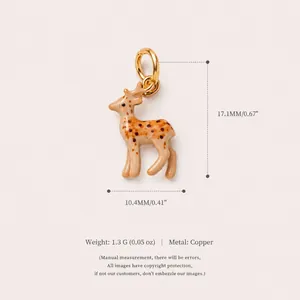 Pendentif faon en cuivre fait main avec taches brunes et anneau doré pour création de bijoux