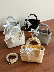 Collection de sacs seaux coréens élégants en cinq couleurs avec nœuds en perles