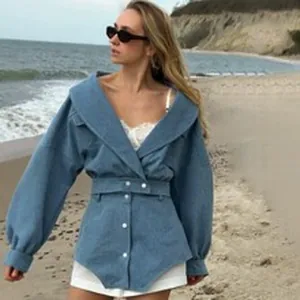 Stylish light blue short denim jacket for women featuring wide lapels and button closure