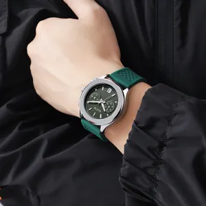 Close-up of SCOTTIE men's green sports chronograph watch with silicone strap on wrist