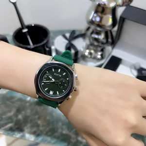 Detail view of SCOTTIE men's chronograph watch with green dial and silicone strap