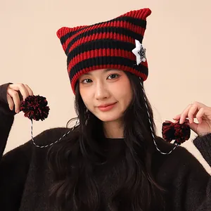 Red and black striped cat ear beanie with star patch and cute pom-poms for women.
