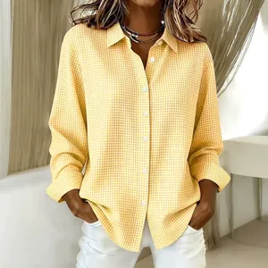 Stylish yellow gingham long sleeve button down shirt for women with a classic turn-down collar