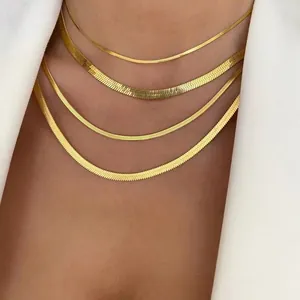 Layered gold-plated stainless steel herringbone snake chain necklace for elegant women's wear