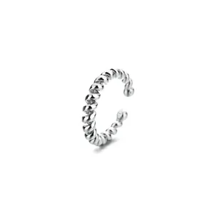 Elegant silver twisted rope ear cuff with a minimalist Moebius inspired line design