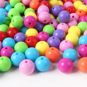Colorful acrylic round beads with holes for DIY handmade jewelry crafting and beading projects.