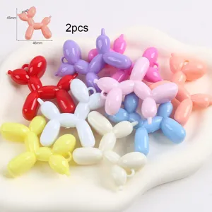 Macro detail of colorful resin balloon dog beads for DIY keychain jewelry making