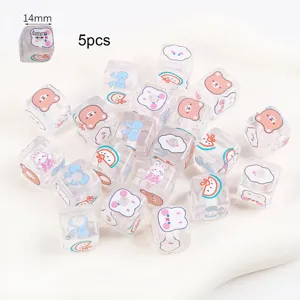 Close-up of 14mm cartoon printed transparent acrylic square beads with 4mm hole