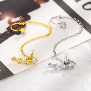 Eleganti orecchini a catena in zircone oro e argento con polsino auricolare integrato