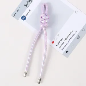 Perlmutt-lila Leder geflochtener Knoten Lanyard Schlüsselanhänger Taschenschmuck Detail.