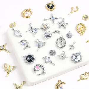 Macro detail of assorted alloy charms with star moon and heart designs for DIY jewelry