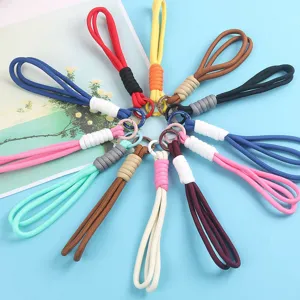 Hand-woven colorful double-strand phone lanyards and keychains in various vibrant colors