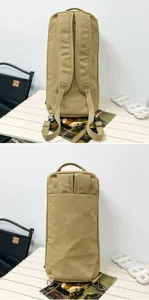 Rear view of khaki canvas cylindrical backpack showing adjustable shoulder straps