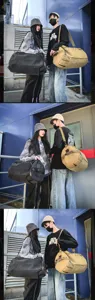 Male and female models carrying large canvas cylinder duffel bags in urban streetwear style.