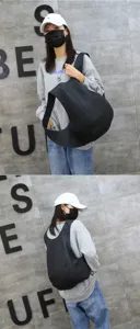 Minimalist black ergonomic backpack shown on model in a stylish street view