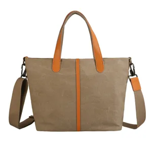 Grand sac cabas en toile kaki avec poignées en cuir orange et bandoulière amovible
