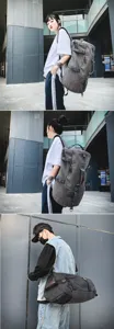 A detailed view of a large grey canvas travel backpack worn by models in a city.