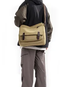 Stylish khaki canvas messenger bag for men with large capacity shown on model back view