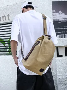 Large capacity khaki canvas crossbody sling bag for men suitable for sports and travel