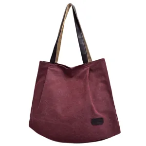 Large capacity burgundy canvas tote bag with stylish two-tone contrast shoulder straps