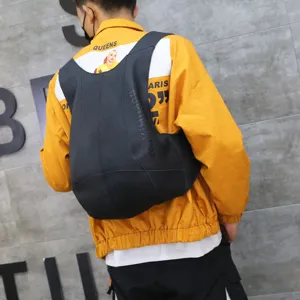 Trendy black pebbled leather backpack with unique vest-style straps for daily use