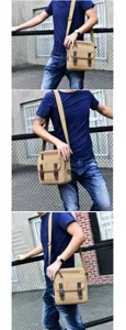Klassische Khaki Segeltuch Umhängetasche für Herren, getragen als Crossbody Tasche.