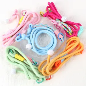 Colorful braided mobile phone lanyard detail, adjustable crossbody strap for use.