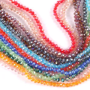 Close-up of colorful faceted crystal rondelle beads for handmade DIY jewelry making