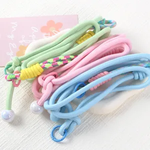 Detailed view of colorful adjustable braided phone lanyards and cross-body strap accessories.