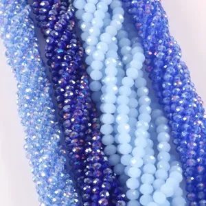 Macro view of multiple shades of blue faceted AB crystal glass beads for DIY crafts