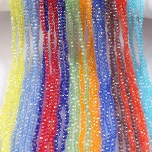 Detailed macro view of vibrant faceted glass rondelle beads for DIY jewelry making projects