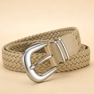Detailed view of a khaki PU woven belt featuring a vintage silver metal pin buckle.