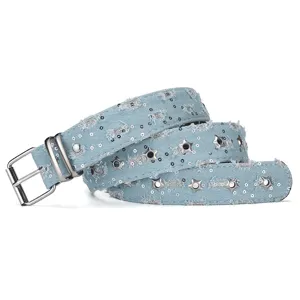 Close-up detail of light blue denim belt with star-shaped metal eyelets and sequins.