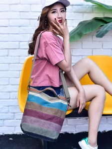 Stylish multi-color striped canvas tote bag with an adjustable shoulder strap for women