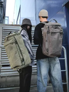 Fashion Large Capacity Canvas Travel Backpack Unisex Outdoor Sports Cylinder Rucksack Trendy Durable Schoolbag For Men And Women