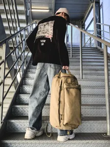 Men's large capacity khaki canvas travel backpack for outdoor sports and hiking