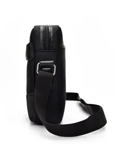 Side view of a black Oxford cloth men's crossbody shoulder bag with adjustable strap