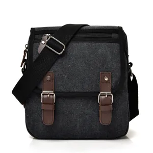 Schwarze Retro Canvas Umhängetasche für Herren mit braunen Schnallenriemen und Gurt