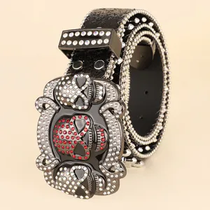 Detailed view of a heavy-duty hip-hop belt with rhinestone skull buckle and studs.