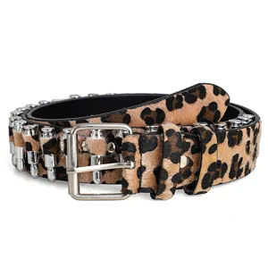 Detailed view of leopard print punk belt with decorative silver bullet studs